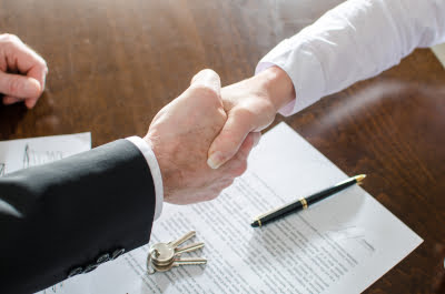 A Handshake signifying a commercial sale deal